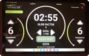 Exercise machine display showing time, glide factor, and a restart button.